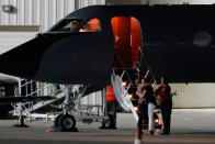<p>Two people hug outside the plane carrying Otto Warmbier, a 22-year-old University of Virginia undergraduate student who was imprisoned in North Korea in March 2016, before he is transferred from a transport aircraft to an ambulance at Lunken regional airport, Tuesday, June 13, 2017, in Cincinnati, Ohio. (Photo: John Minchillo/AP) </p>