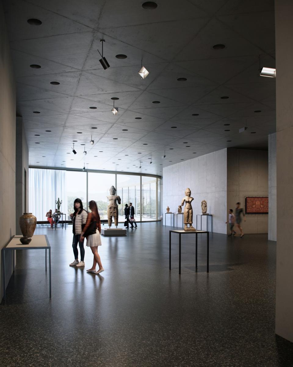 An architectural rendering shows Asian statuary on display in a poured concrete gallery with a window in the distance