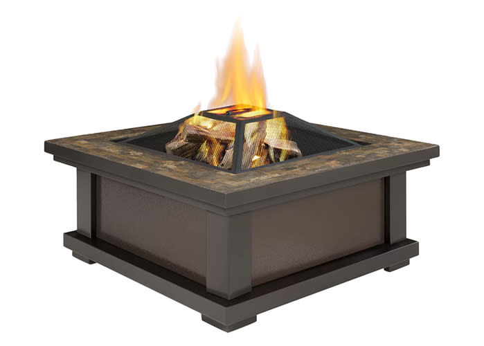 Spruce up any outdoor area with this sleek fire pit, which features a stylish slate tile top and uses real wood to warm up the space. (Photo: Wayfair)