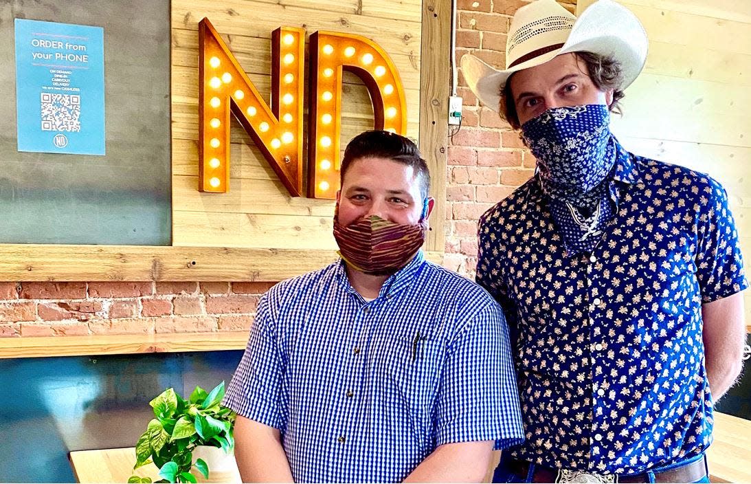 Kimbal Musk, right, and Next Door Eatery General Manager George Gianopoulos are pictured in this photo from 2020.