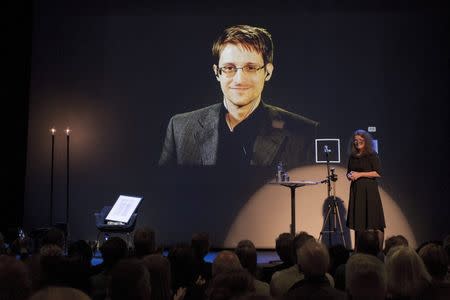 A chair is pictured on stage as former U.S. National Security Agency contractor Edward Snowden is awarded the Bjornson prize Molde, Norway, in this September 5, 2015 file photo. REUTERS/Svein Ove Ekornesvaag/NTB Scanpix/Files