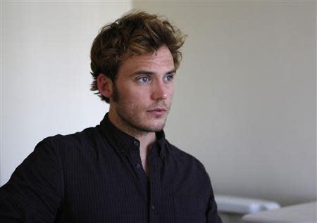 British actor Sam Claflin poses for a portrait while promoting his upcoming movie "The Quiet Ones" at Chateau Marmont in West Hollywood, California April 22, 2014. REUTERS/Mario Anzuoni