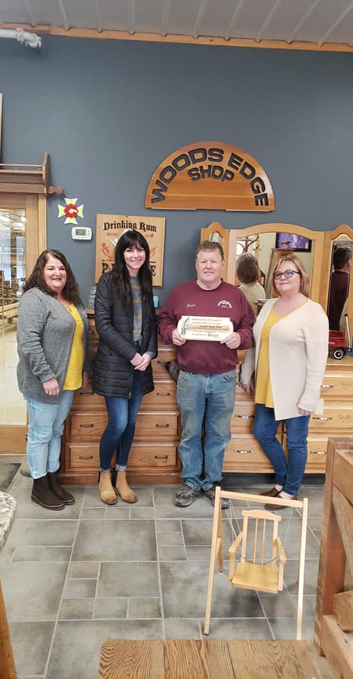 Habitat for Humanity Board Treasurer Valerie Engels, left, Vice President Jill Schoenfeld, Woods Edge Shop owner Keven Pommier and board President Roberta Bartel. Woods Edge Shop was recently recognized for its support of the agency.