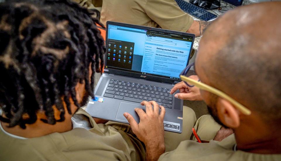 Students work through a coding problem at the ACI. “These are the kinds of jobs many people can do,” says state Sen. Louis DiPalma, who advocated for bringing The Last Mile to Rhode Island. DiPalma, a technical director at Raytheon, says “the need for software engineering is going to intensify.”