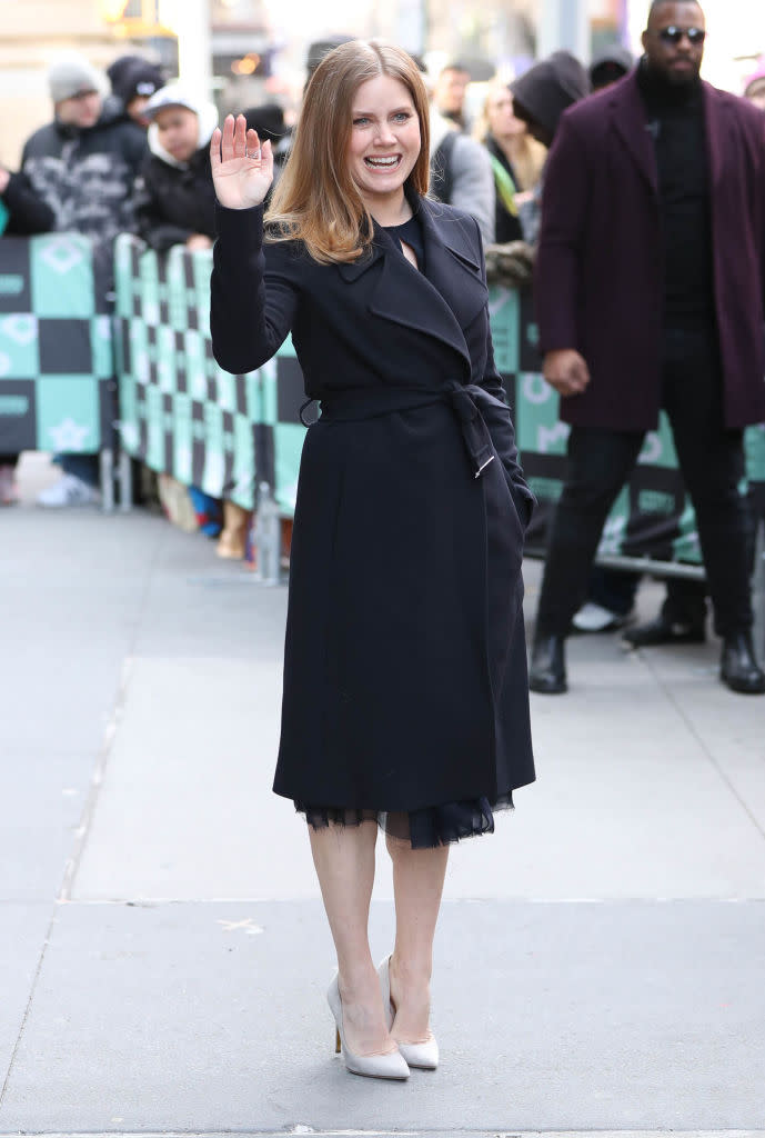 Emma Stone Dons Louis Vuitton Trench-Inspired Mini Dress At NYC