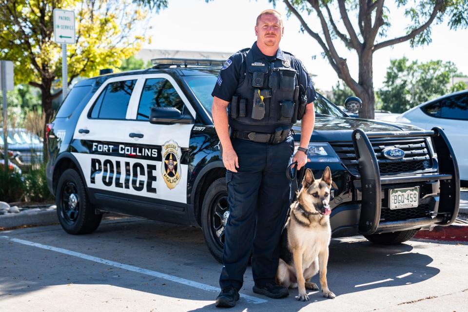 Fort Collins Police Sgt. Ryan Barash and his K-9 partner, Inox, stand for a picture on Tuesday. Inox, who retired this month, survived a stabbing and is credited with saving Barash’s life twice in their eight years working together.