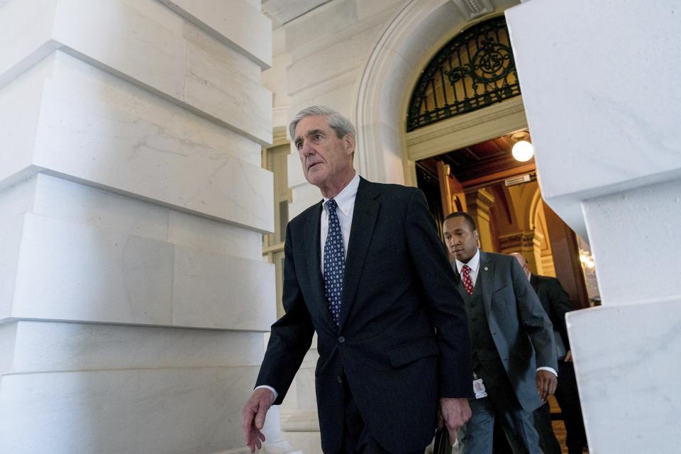 FILE - In this June 21, 2017 file photo, former FBI Director Robert Mueller, the special counsel probing Russian interference in the 2016 election, departs Capitol Hill following a closed door meeting in Washington. (AP Photo/Andrew Harnik, File)