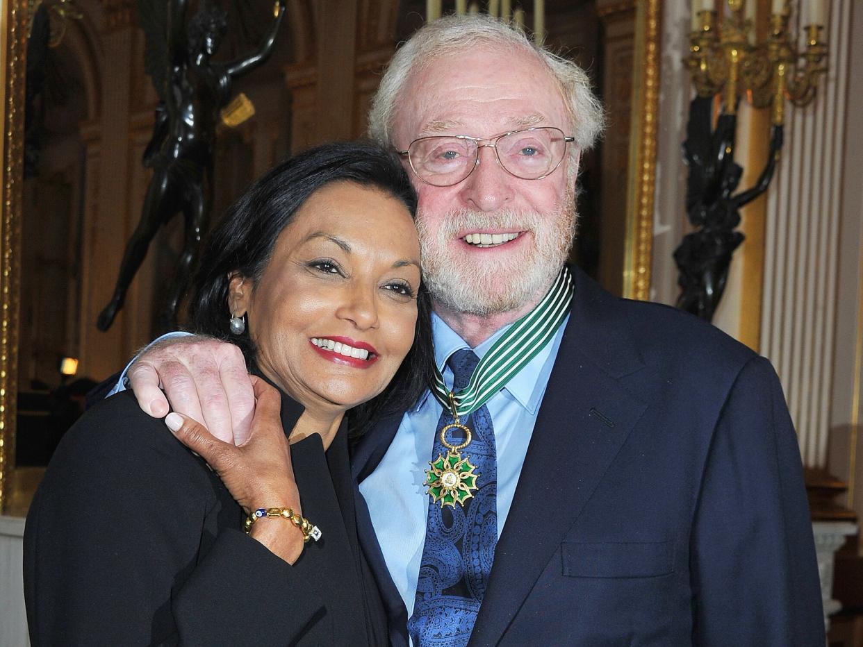 Sir Michael Caine poses with his wife Shakira after being awarded "Commandeur des arts et des lettres" by French Culture Minister Frederic Mitterrand at Ministere de la Culture on January 6, 2011 in Paris, France