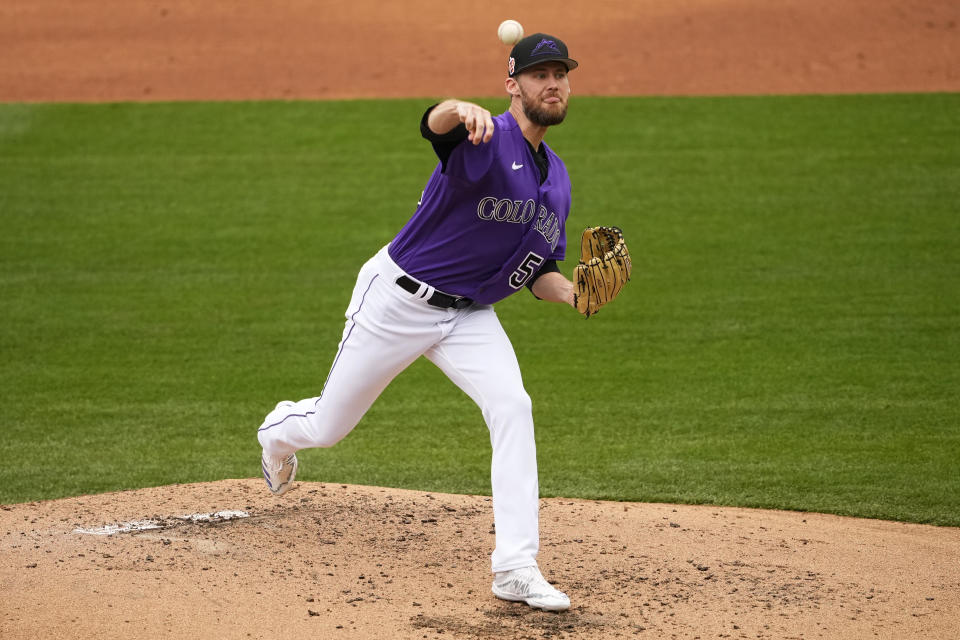 Colorado Rockies relief pitcher Daniel Bard throws against the Kansas City Royals during the third inning of a spring training baseball game, Wednesday, March 1, 2023, in Scottsdale, Ariz. (AP Photo/Matt York)