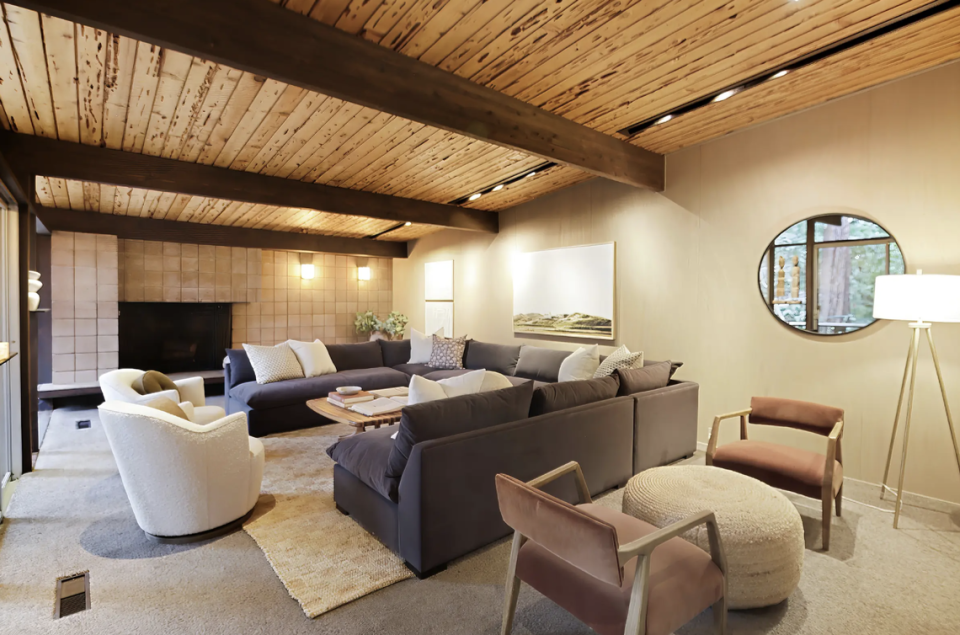 The classic mid-century modern sunken living room with fireplace.