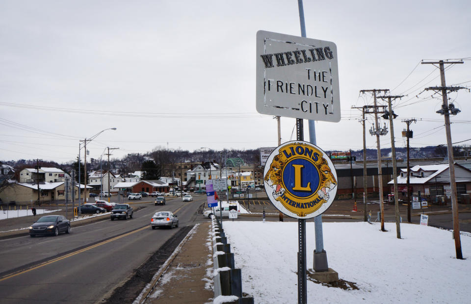 Road signs are posted at the entrance to a city nicknamed "Friendly City" which recently passed a city ordinance protecting LGBT people in Wheeling, West Virginia, February 10, 2017. Picture taken on February 10, 2017. REUTERS/Letitia Stein