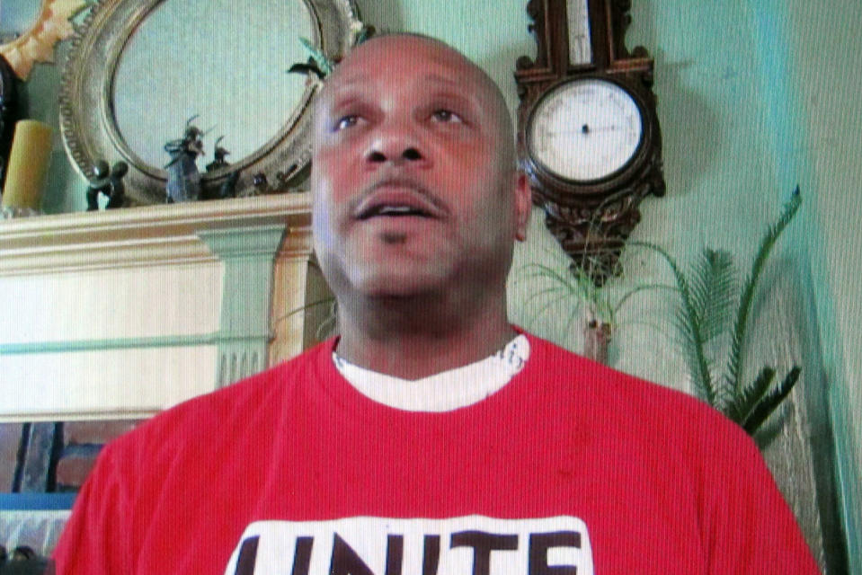 In this image taken from video, Jeffery Payne, a server in the VIP lounge at Caesars casino in Atlantic City, N.J., discusses the continuing unemployment of many casino workers during an online meeting from his home, Wednesday, July 8, 2020. Many Atlantic City casino workers were ready to return to work on July 2 until Gov. Phil Murphy banned indoor dining due to the virus outbreak, preventing casinos from opening their restaurants and canceling plans to bring these workers back. (AP Photo/Wayne Parry)