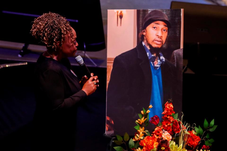 Lisa Shahan Choat, Ramon McGhee’s mother, looks at a photo of her son next to his casket as she speak during the service for McGhee, the man who died in Shelby County Jail custody covered in bed bugs and feces, at Mississippi Boulevard Christian Church in Memphis, Tenn., on Tuesday, March 5, 2024.
