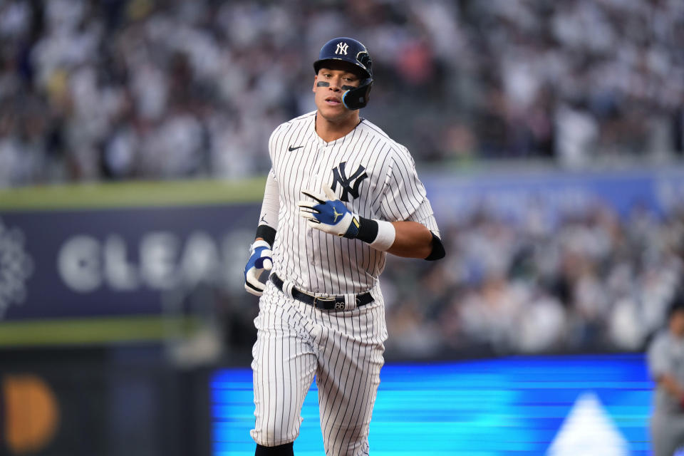 New York Yankees' Aaron Judge runs the bases after hitting a home run against the Minnesota Twins during the first inning of a baseball game against the Minnesota Twins on Friday, April 14, 2023, in New York. (AP Photo/Frank Franklin II)