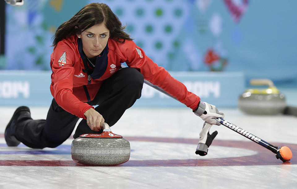 Great Britain's skip Eve Muirhead delivers the rock during the women's curling competition against the United States at the 2014 Winter Olympics, Tuesday, Feb. 11, 2014, in Sochi, Russia. (AP Photo/Wong Maye-E)