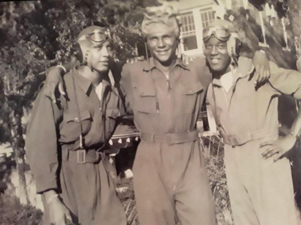 Dr. Robert Higginbotham, pictured left, was a member of the Tuskegee Airmen. He died on Thursday at the age of 96.