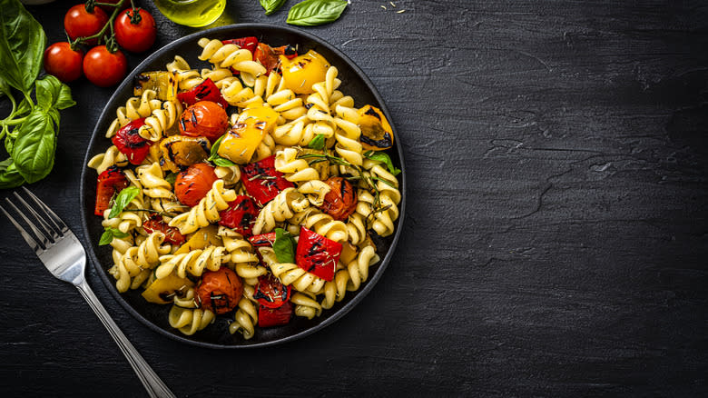 Pasta salad on dark background