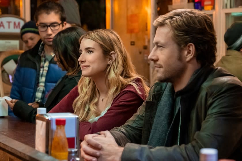 Emma Roberts and Luke Bracey find reasons to see each other only on holidays in the Netflix romcom "Holidate."