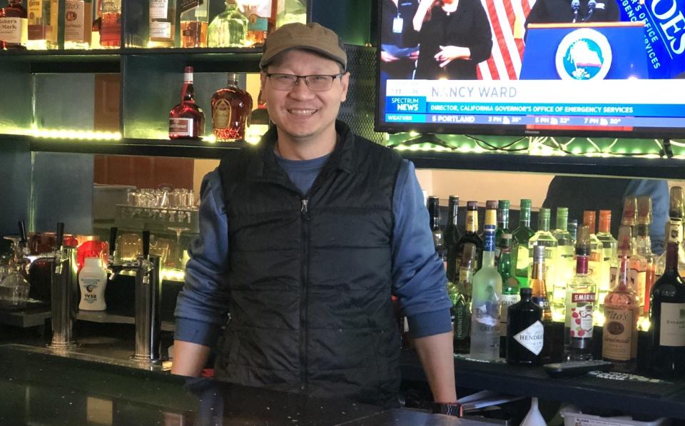 Tony Lin stands at the bar of his new restaurant, Kai Asian Fusion, in Wells, Maine, on Monday, Feb. 5, 2024.