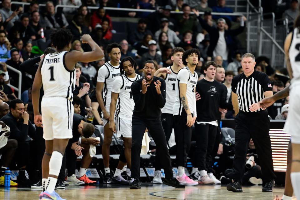 Providence head coach Kim English reacts to game action during the second half against Marquette at the Amica Mutual Pavilion on Tuesday.