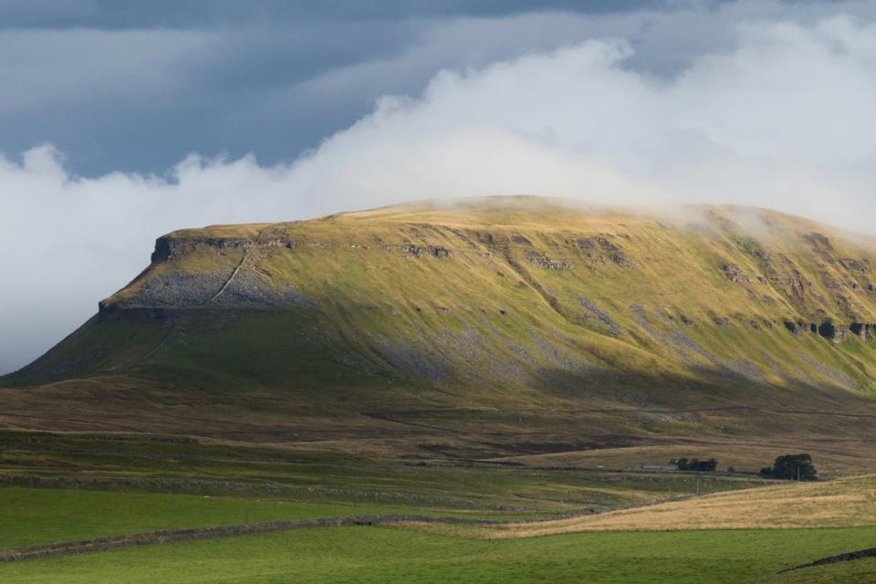 Pen-y-ghent mountain in the early Autumn fog (Getty Images/iStockphoto)