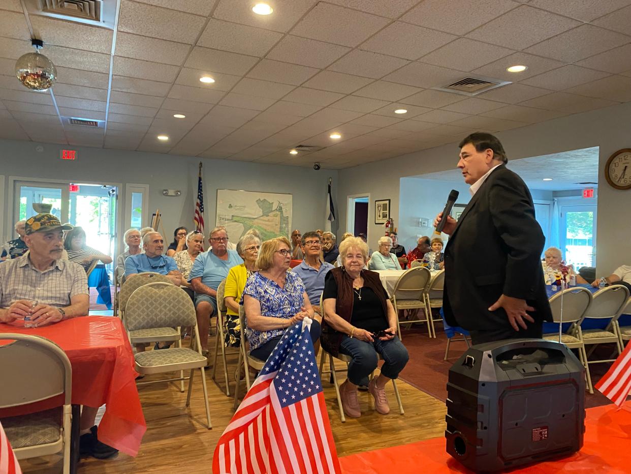 State Sen. Marc Pacheco, D. Taunton, speaks to residents at Leisurewoods in Taunton about the state of manufactured housing and the safeguards and laws to help residents on Saturday, June 13, 2024. Pacheco was invited by the Homeowners Association amid their allegations of rent disparities and aging infrastructure at Leisurewoods.