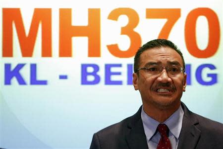 Malaysia's acting Transport Minister Hishammuddin Hussein addresses reporters about the missing Malaysia Airlines flight MH370, at Kuala Lumpur International Airport March 20, 2014. REUTERS/Damir Sagolj