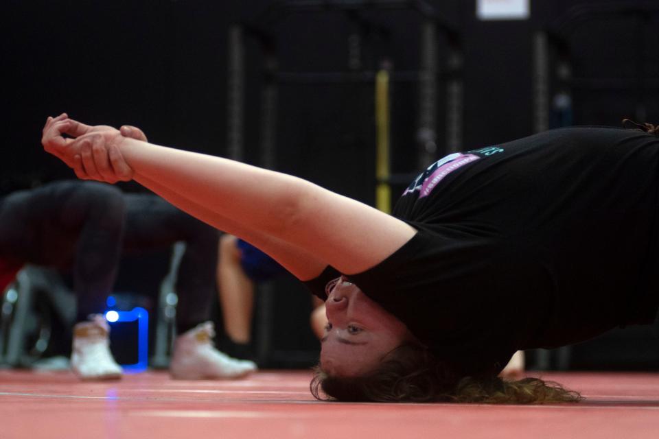 Senior wrestler Trinity Monaghan attends wrestling practice at Souderton High School on Thursday, Jan. 6, 2022. 