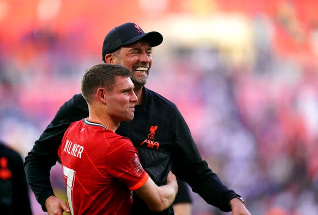 Jurgen Klopp hugs James Milner