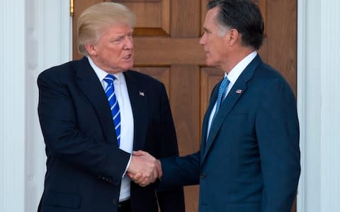 Donald Trump and Mitt Romney, the Utah senator and former Republican presidential nominee, have not always seen eye to eye - Credit: Don EMMERT / AFP