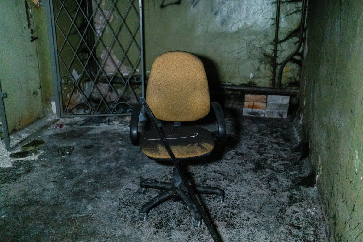 Plastic ties for torture and a broken chair were pictured inside a basement in Kherson (REUTERS/Anna Voitenko)