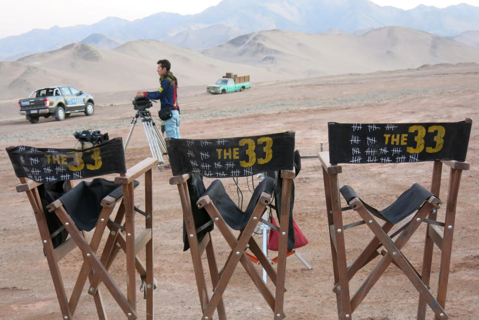 In this Feb. 11, 2014 photo, directors chairs sit in the desert on the set of the film "The 33" near Copiapo, Chile. The film dramatizes a cave-in that trapped 33 miners deep below Chileís Atacama desert for 69 days in 2010. Juliette Binoche and Antonio Banderas are starring in the film based on the televised rescue that mesmerized millions of people around the globe. The movie is being shot in English and is expected to be released next year. (AP Photo/Eva Vergara)