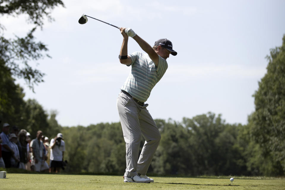 Jerry Kelly tees off on the fourth hole during the third round of the U.S. Senior Open golf tournament Saturday, June 29, 2019, in South Bend, Ind. (John Mersits/South Bend Tribune via AP)