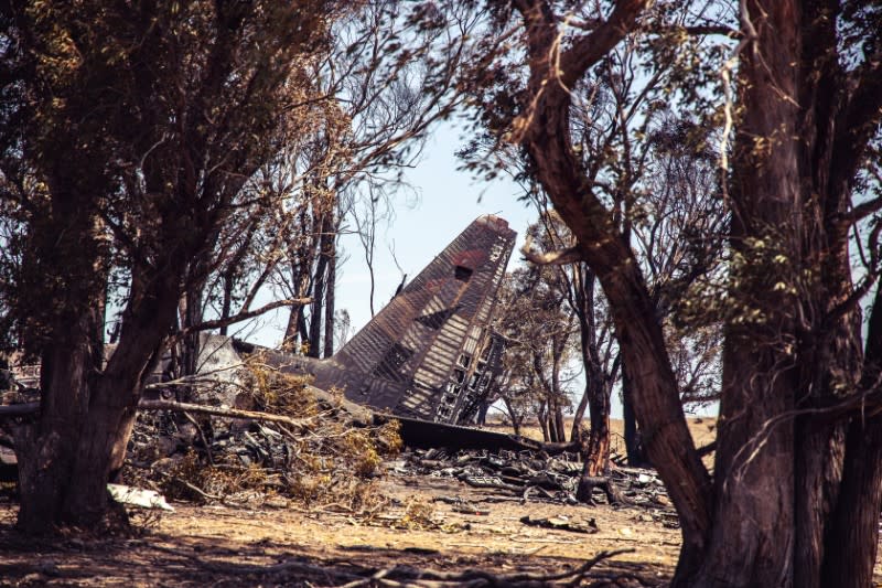 Debris seen following the crash of a C-130 air tanker plane after dropping fire retardant, in this January 24, 2020 picture obtained from social media, in Snowy Mountains, New South Wales, Australia