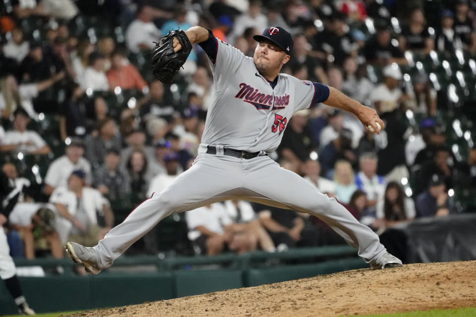 Minnesota Twins relief pitcher Caleb Thielbar delivers during the ninth inning of the team's baseball game against the Chicago White Sox on Wednesday, July 21, 2021, in Chicago. The Twins won 7-2. (AP Photo/Charles Rex Arbogast)