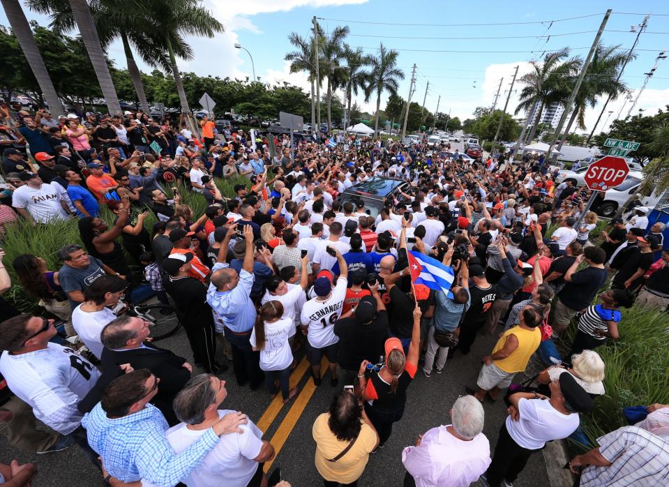 <p>Miami Marlins players and members of the Marlins organization and their fans surround the hearse carrying Miami Marlins pitcher Jose Fernandez to pay their respects on September 28, 2016 in Miami, Florida. Mr. Fernandez was killed in a weekend boat crash in Miami Beach along with two friends. (Photo by Rob Foldy/Getty Images) </p>