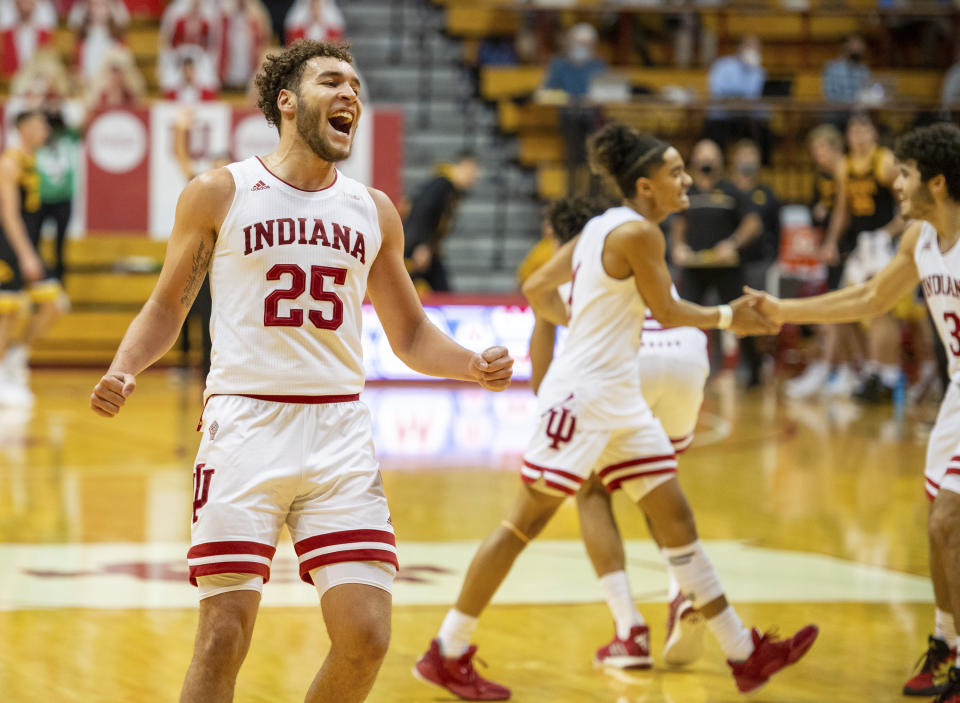 Indiana forward Race Thompson (25) reacts as his team takes a lead during the second half of an NCAA college basketball game against Iowa, Sunday, Feb. 7, 2021, in Bloomington, Ind. (AP Photo/Doug McSchooler)