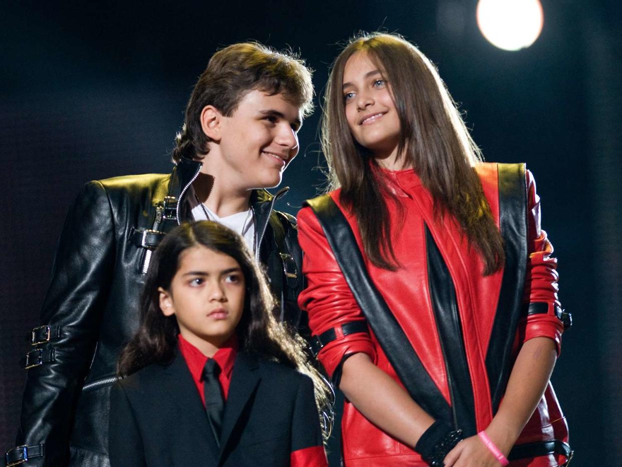 Prince Michael Jackson, Blanket Jackson and Paris Jackson appear on stage at the Michael Forever Tribute Concert in memory of the late Michael Jackson at the Millennium Stadium on October 8, 2011 in Cardiff, Wales