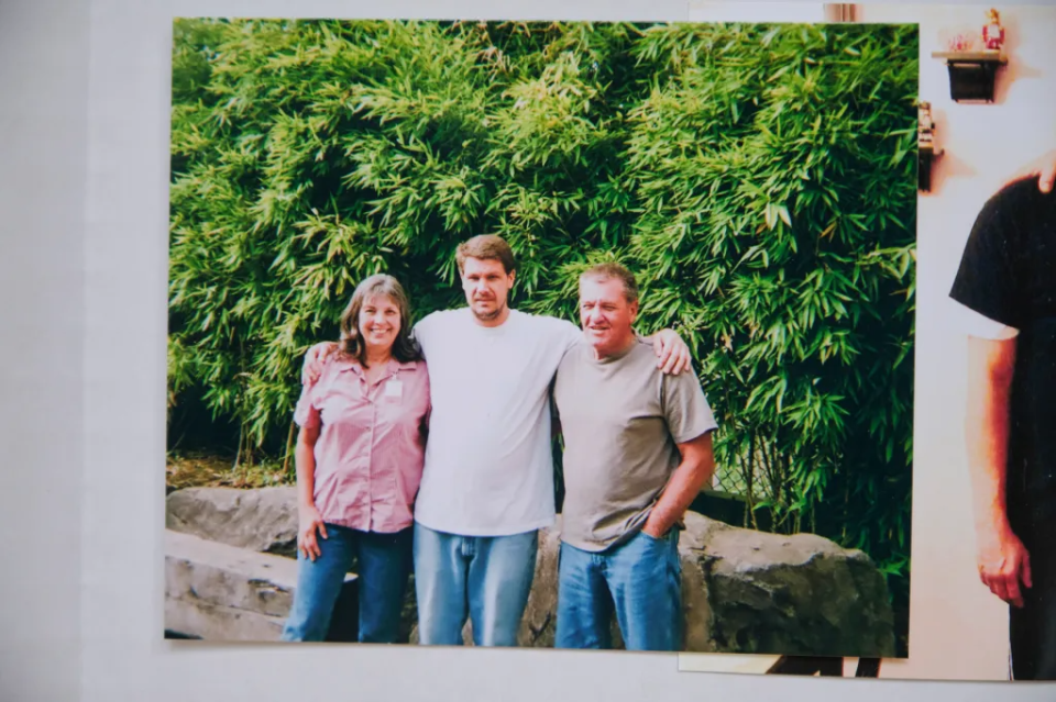 A 2007 photo of Adam Collier with his parents, Susan Ottele and Will Collier, at Oregon State Hospital in Salem.