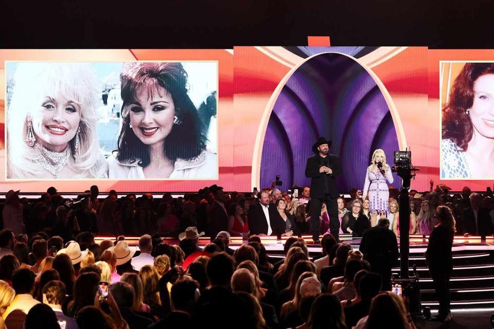 Theo Wargo/Getty  Dolly Parton and Garth Brooks