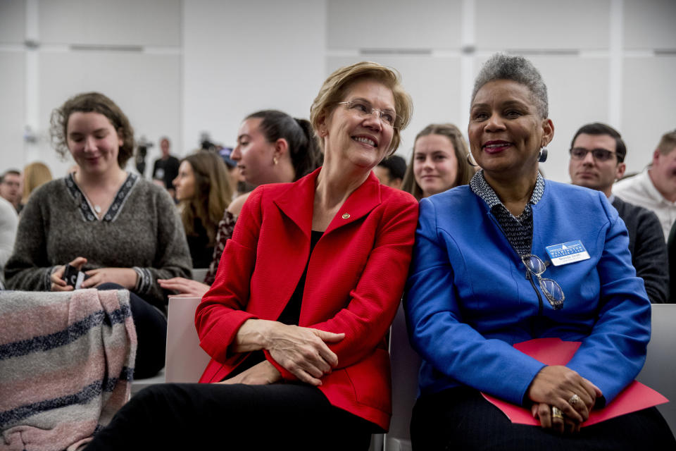 Sen. Elizabeth Warren (D-Mass.) speaks with American University senior associate dean Brenda Smith, right, after speaking at the Washington College of Law on Nov. 29. (Photo: ASSOCIATED PRESS)