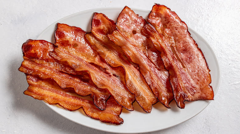 Crispy bacon strips on a plate