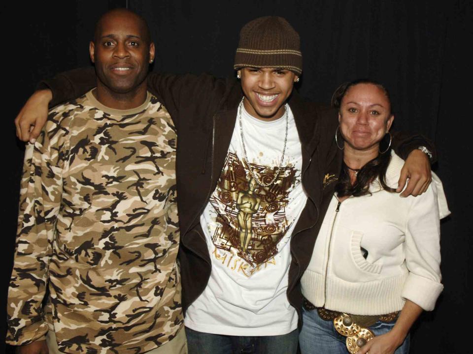 <p>L. Busacca/WireImage</p> Clinton Brown, Chris Brown and Joyce Hawkins.