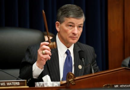 FILE PHOTO: Chairman of the House Financial Services Committee Jeb Hensarling (R-TX) raises his gavel as Treasury Secretary Steven Mnuchin testifies on Capitol Hill in Washington, U.S., February 6, 2018. REUTERS/Joshua Roberts