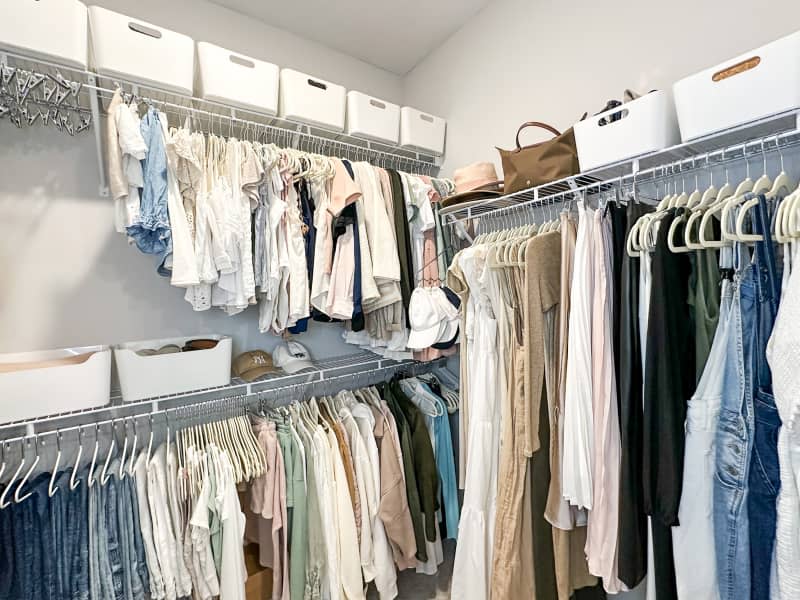Clothing hanging in closet.