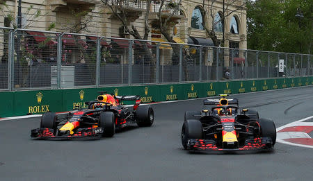 Formula One - F1 - Azerbaijan Grand Prix - Baku City Circuit, Baku, Azerbaijan - April 29, 2018 Red Bull's Daniel Ricciardo and Max Verstappen in action during the race REUTERS/David Mdzinarishvili