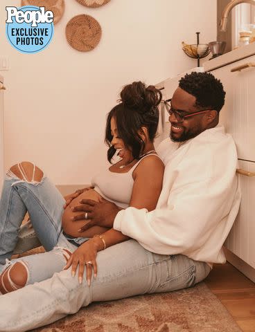 <p>Dalvin Adams Photography</p> Bresha Webb and husband Nick Jones Jr.