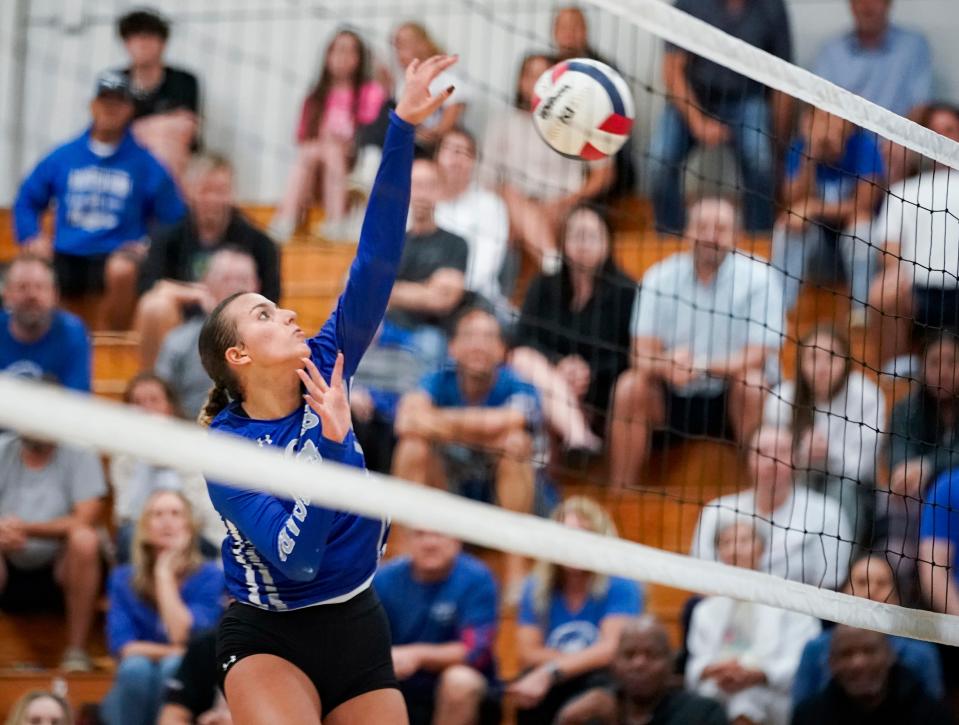 Barron Collier Cougars outside hitter Aisha Keric (17) goes for a kill during the Class 5A Region 3 championship against the Gulf Coast Sharks at Barron Collier High School in Naples on Wednesday, Nov. 1, 2023.