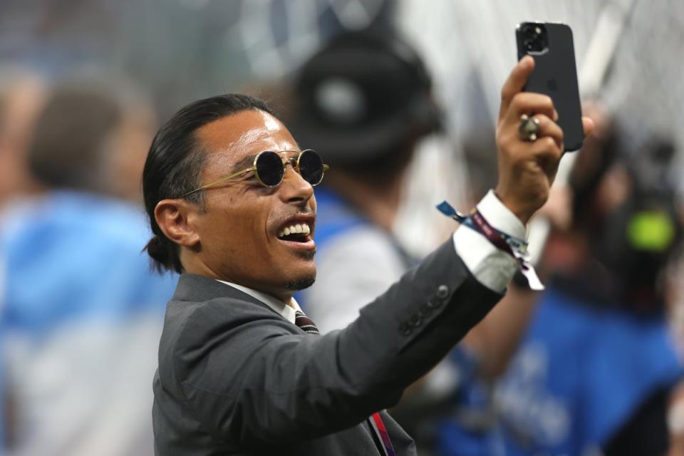 Salt Bae on the pitch in Qatar (Getty)