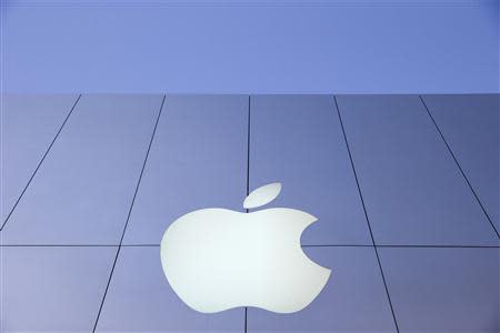 An Apple logo is seen during Black Friday in San Francisco, California in this file photo from November 29, 2013. REUTERS/Stephen Lam/Files